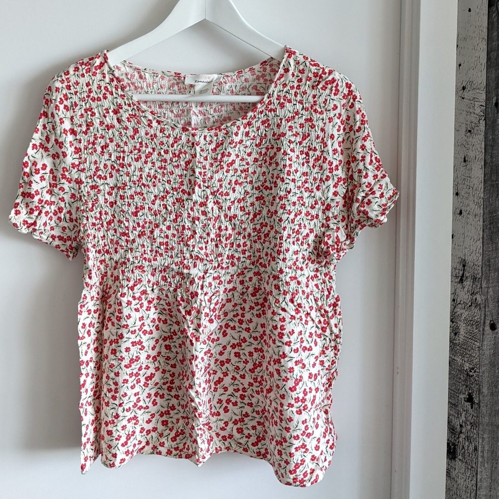 Red floral patterned blouse